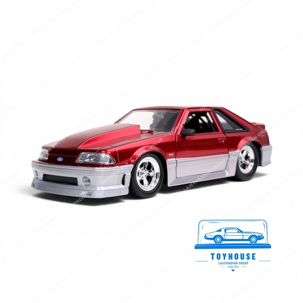 ماکت فلزی فورد موستانگ GT مدل 1989 قرمز متالیک سری Bigtime Muscle برند Jada Toys مقیاس 1:24 با جزئیات بالا، بدنه دایکست کلکسیونی و طراحی تیونینگ آمریکایی